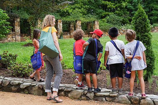 Students at Duke Gardens explore nature.