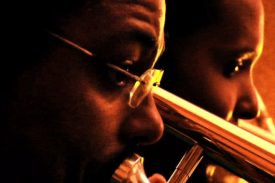 Two trumpet players, a film still from One Night in Kernersville