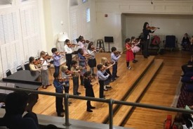 Duke String School Violin Choir performing in the Nelson Music Room