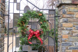 A festive holiday wreath on the Gothic Gate