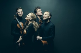 St Lawrence String Quartet against a dark background by Marco Borggreve