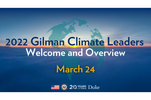 World map overlaid on a view of ocean with sunrise. Text: 2022 Gilman Climate Leaders Welcome and Overview, March 24. At bottom: American flag, logos for U.S. State Department, Gilman Scholars Program, Duke University.