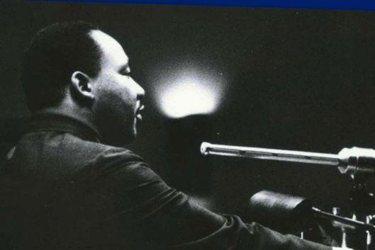 Black &amp; white, iconic image of Dr. Martin Luther King, in silhouette, speaker at the Duke Chapel in 1964