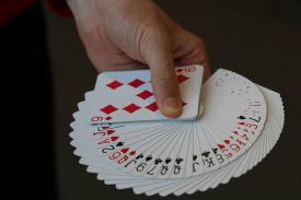 Hand holding a deck of cards Hand holding a deck of cards
