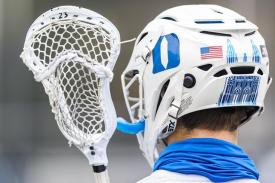 player holding lacrosse stick