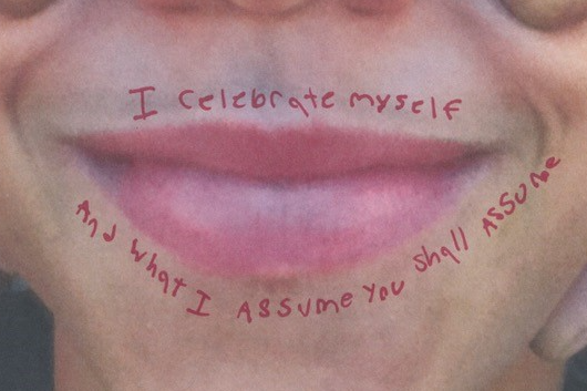 An example of a Literacy Through Photography exercise. Mixed media. A picture of a child making hand goggles is drawn on and art is pasted on the picture as well: clipped art of a tree on their forehead, an atom pasted on their nose, and the words "I celebrate myself and what I assume you shall assume" outlined around their smile. An example of a Literacy Through Photography exercise. Mixed media. A picture of a child making hand goggles is drawn on and art is pasted on the picture as well: clipped art of a tree on their forehead, an atom pasted on their nose, and the words "I celebrate myself and what I assume you shall assume" outlined around their smile.