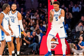 Duke players on the floor Duke players on the floor