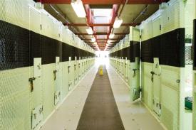 Inside of cell block at Guantanamo Navel Base.