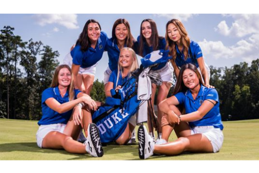Women's golf team pose for group picture