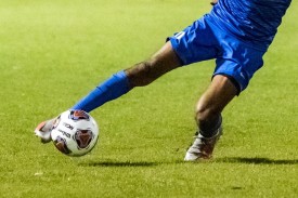 Soccer player kicking ball Soccer player kicking ball