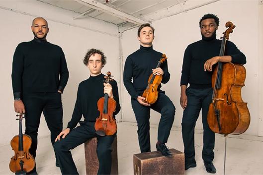 The members of Isidore String Quartet photographed by Charles Chessler.