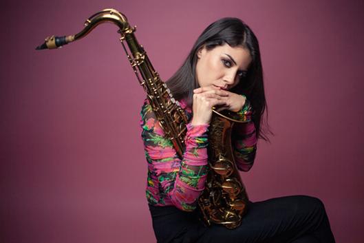 Melissa Aldana with her saxophone photographed by Eduardo Pavez Goye
