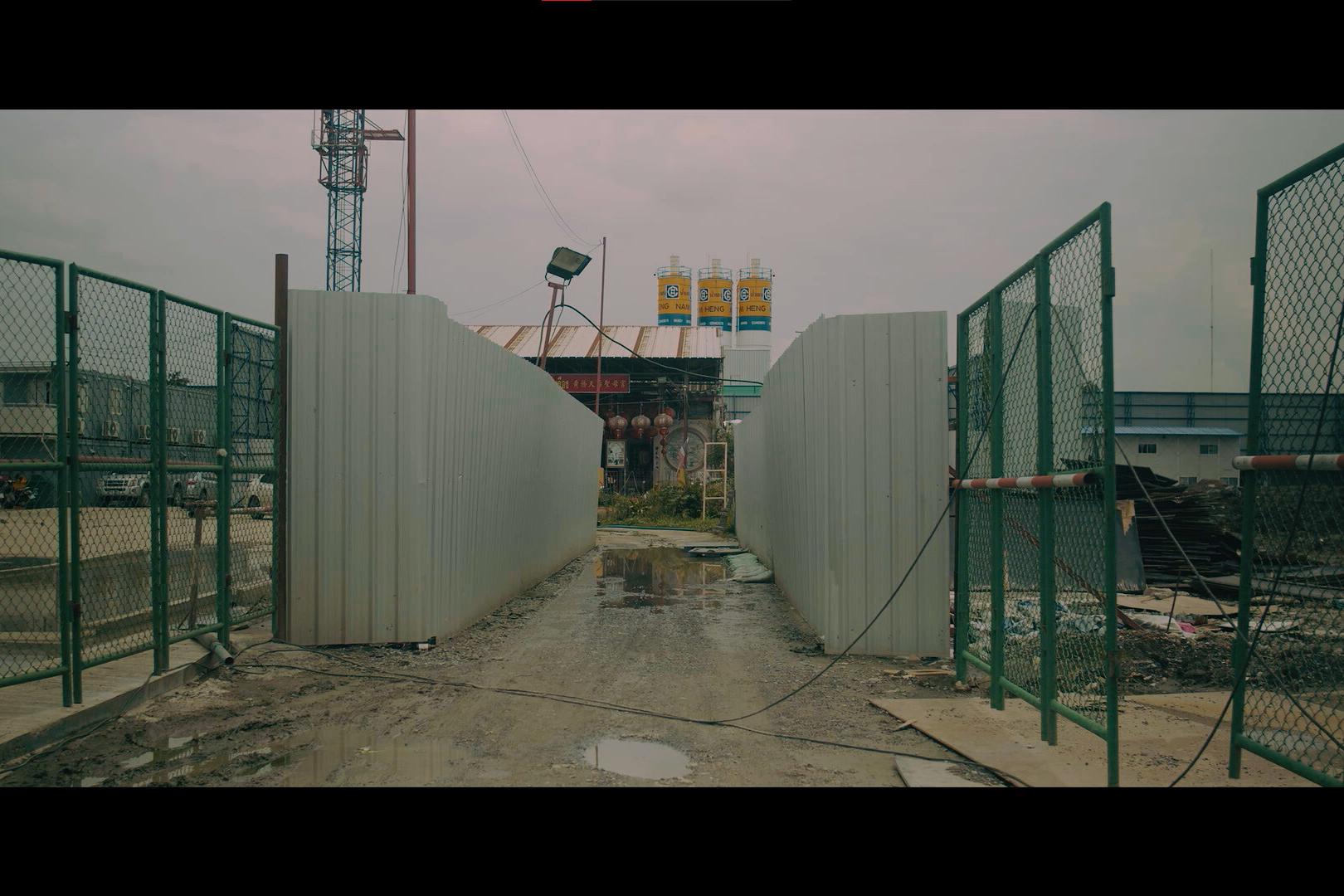 The entrance to a shrine surrounded by a construction zone